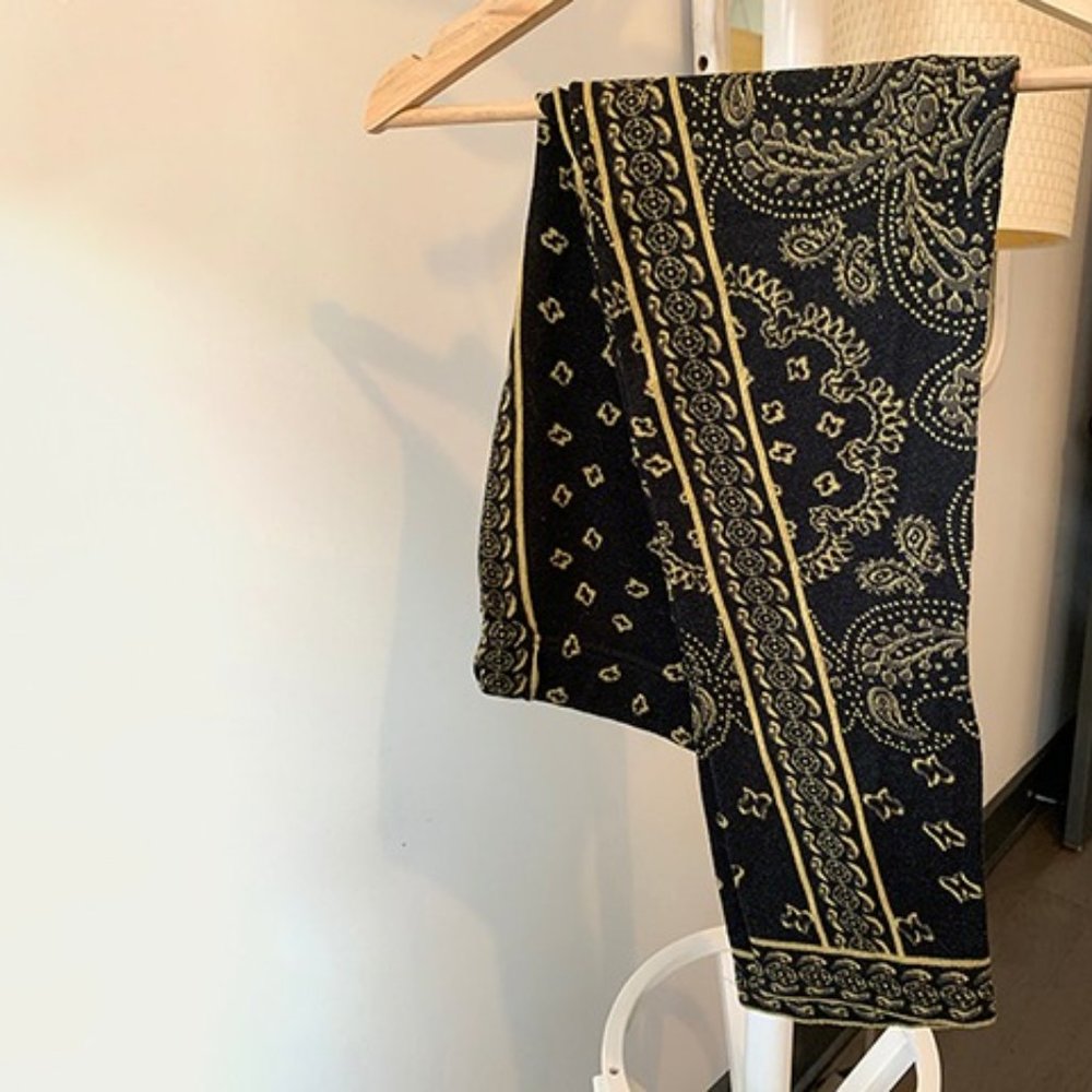 black sweater leggings with gold and gray pattern